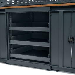 Workbenches with 15 drawers, 1 cabinet, and a tool rack