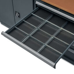Workbenches with 15 drawers, 1 cabinet, and a tool rack