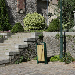 Free-standing outdoor waste bin steel waste pin with wooden walls on foot